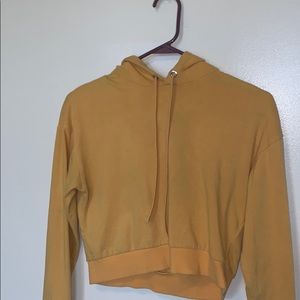 Yellow H&M women’s cropped hoodie